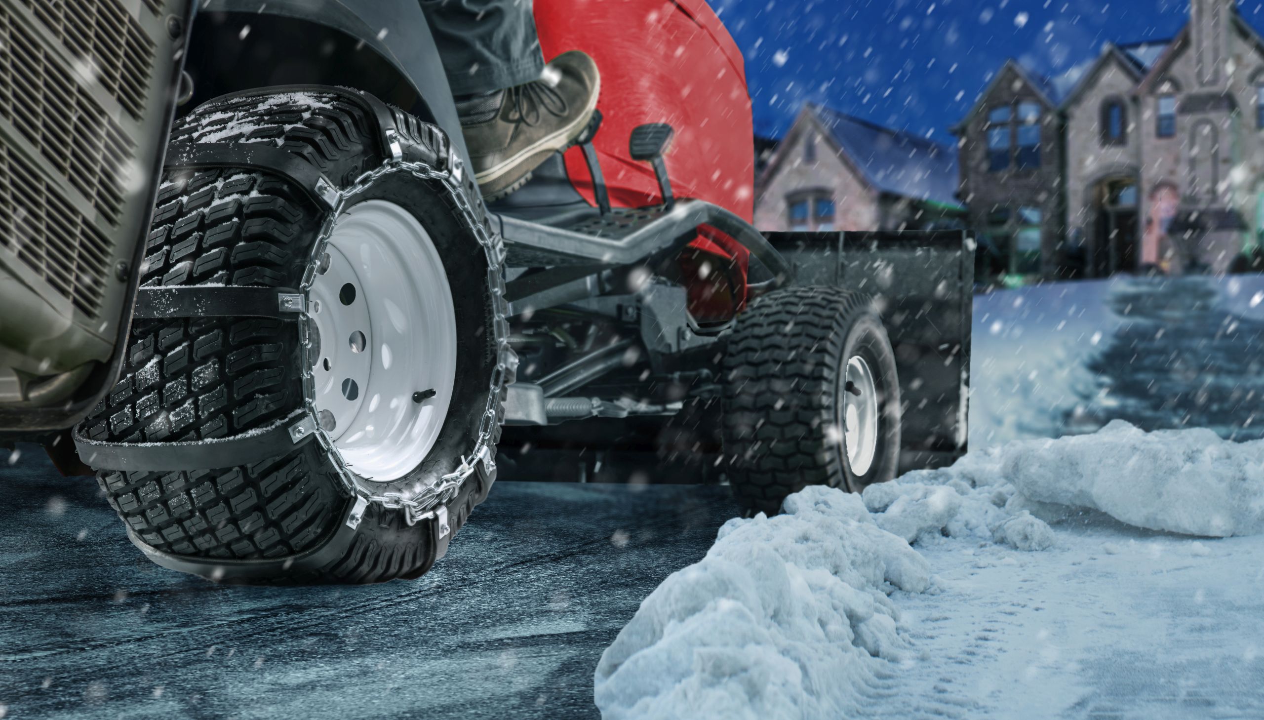 SoftClaw Rubber Tire chains in use on a snowplow